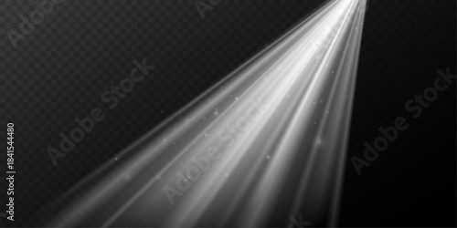 Abstract radiant rays of light with twinkling sparkling particles.