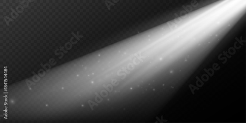 Radiant rays of light with sparkling particles floating in space.