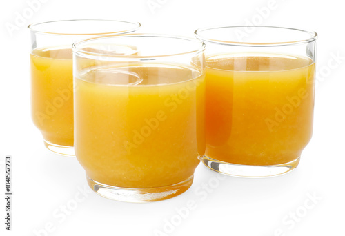 Fresh orange juice in glasses isolated on white