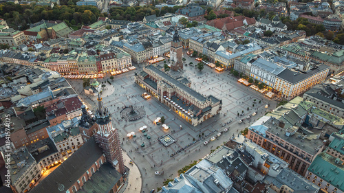 Dron view of Krakow s Main Market Square with Cloth Hall, Town Hall Tower and historic architecture.