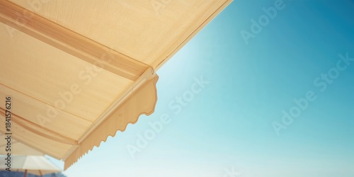 Fototapeta Naklejka Na Ścianę i Meble -  Close-up of beach awning, serving as a summer outdoor shading solution