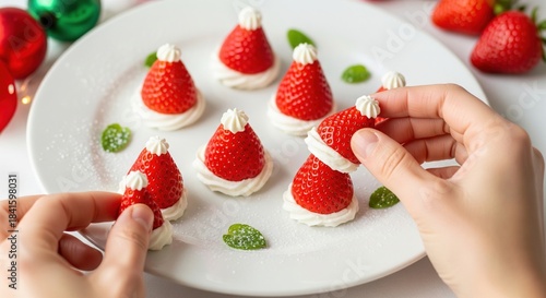 Festive Strawberry Santa Hats with Whipped Cream and Green Accents