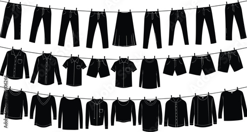 Black silhouettes of various freshly laundered clothing items, including pants, shirts, skirts, and sweaters, 