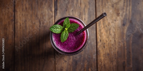 Blueberry smoothie in a gla...