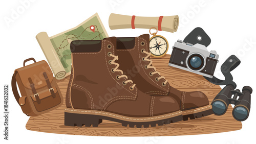 Hiking gear and accessories arranged on a wooden board including brown boots map compass camera and binoculars