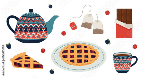 Cozy tea time collection with a decorative teapot berry pie chocolate tea bags and a matching mug on a white background.