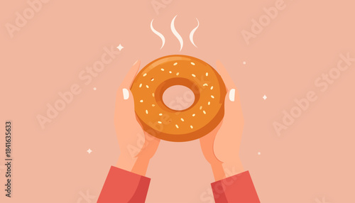 Two hands gently holding a warm, freshly baked bagel with sesame seeds, emitting steam against a pink background.