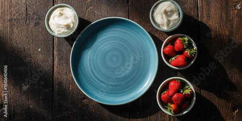 Blue plate with strawberrie...
