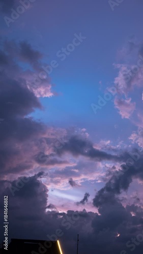 Wallpaper Mural Vertical video - Timelapse of colorful dusk sky with thick clouds Torontodigital.ca