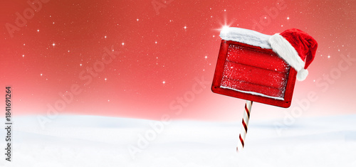 Rotes Weihanchtsschild vo einem Toten Hintergrund