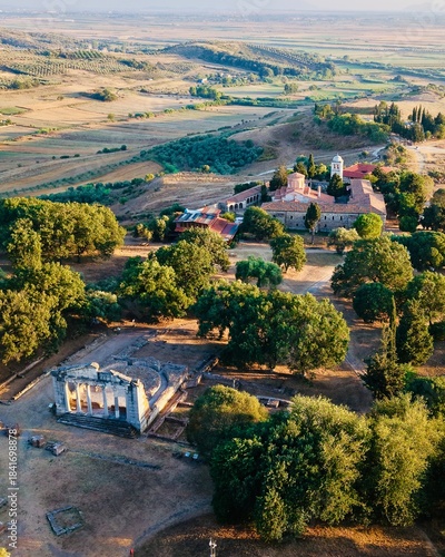 🌳 Aerial view of Apolonia ruins and surrounding landscape, Albania