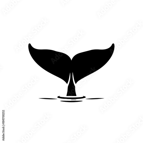 Whale's Tail Silhouette: A striking silhouette of a whale's tail emerges from the water, conveying a sense of majesty and the mystery of the deep ocean.
