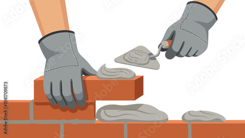 Person wearing gloves laying bricks with mortar on a