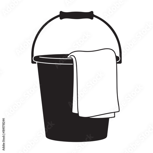 Black bucket with towel hanging over the edge