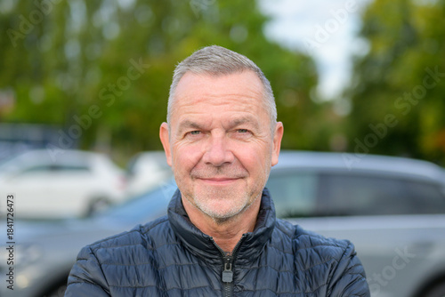 Mature Man Smiling At Camera