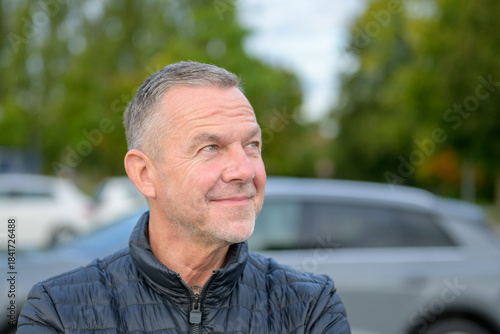 Mature Man Looking Up Smiling