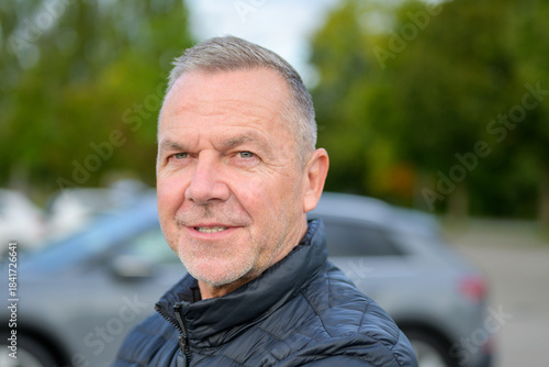 Confident Mature Man Smiling Outdoors