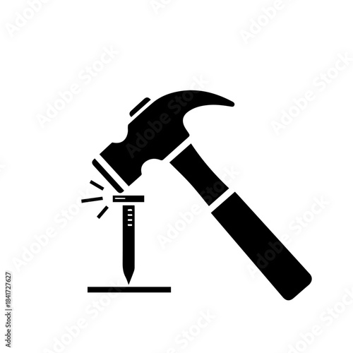 Hammering it Home: A black silhouette of a hammer, driving a nail into wood, embodying construction and craftsmanship.