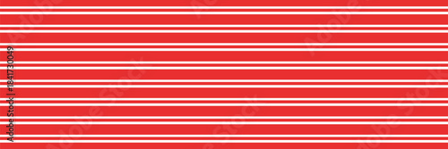 Christmas candy cane striped seamless pattern. Christmas candycane background with red stripes. Caramel diagonal print. Xmas traditional wrapping texture. Vector illustration.Eps10