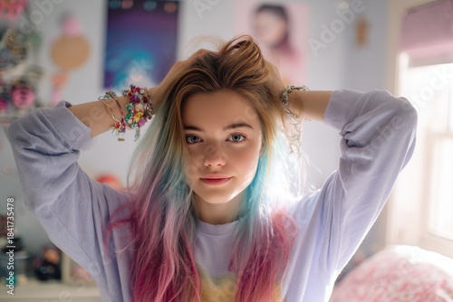 Teen girl showing colorful dip-dye hair as a form of self-expression in a cozy bedroom.