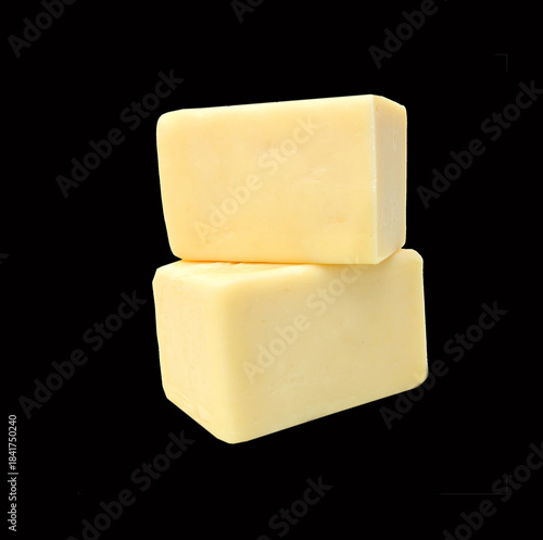 Piece of cheese isolated on a black background