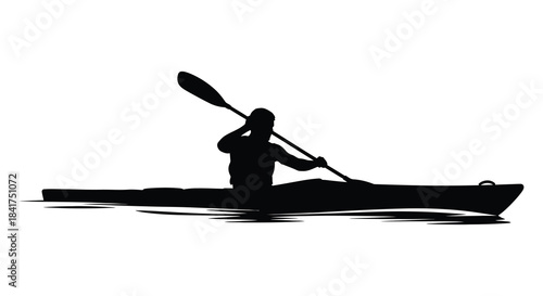 A lone kayaker paddling across still waters presented as a striking black silhouette