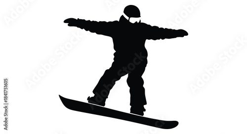 A dynamic image of a snowboarder in mid air arms outstretched captured as a striking silhouette
