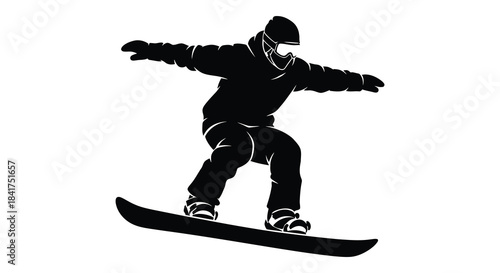 A dynamic snowboarder in mid air captured in a striking black and white silhouette