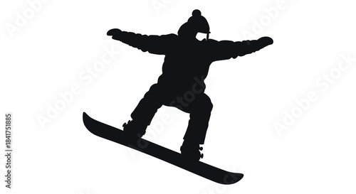 A dynamic depiction of a snowboarder in mid air arms outstretched captured as a silhouette