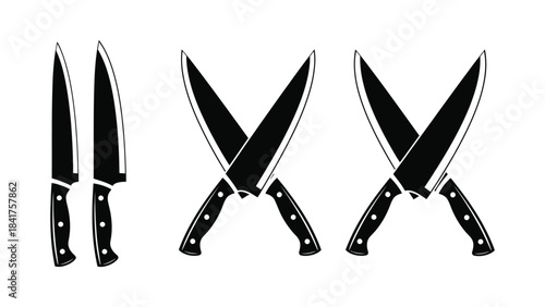 A set of three pairs of kitchen knives with black handles isolated on