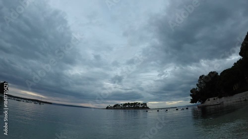 timelapse of clouds, late afternoon, late autumn small bay, island of Rab, Croatia, Mediterranean