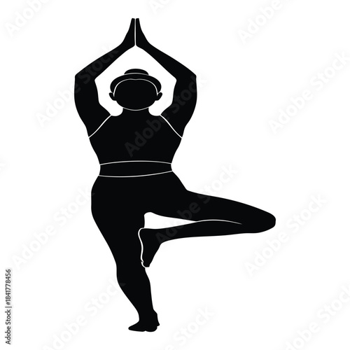 A black silhouette of a person performing the vrikshasana yoga pose