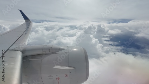 Airliner Wing View Above the Clouds