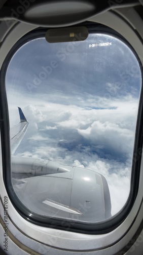 Airliner Wing View Above the Clouds
