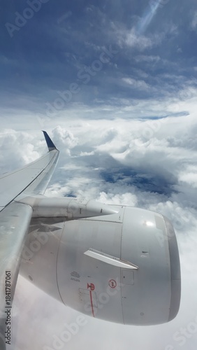 Airliner Wing View Above the Clouds