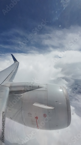 Airliner Wing View Above the Clouds