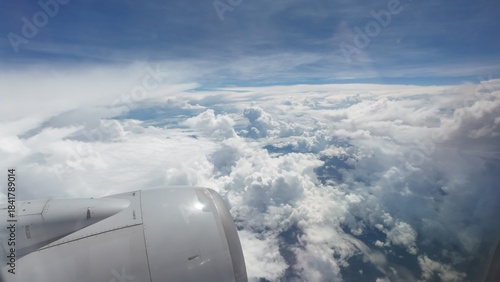 Airliner Wing View Above the Clouds