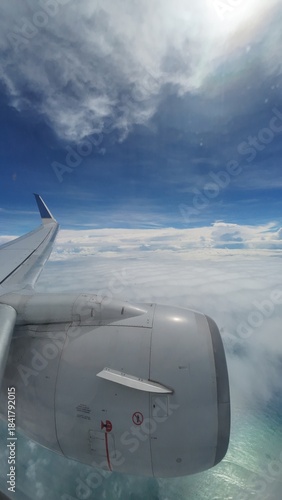 Airliner Wing View Above the Clouds