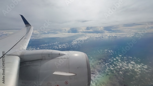 Airliner Wing View Above the Clouds