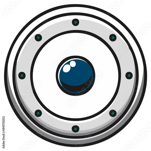 Circular metallic object with a central blue eye symbol and surrounding rivets