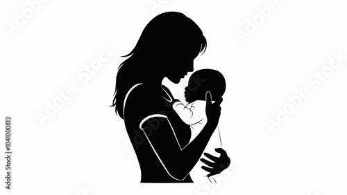 Silhouette of mother holding a newborn baby in her arms, love and care concept