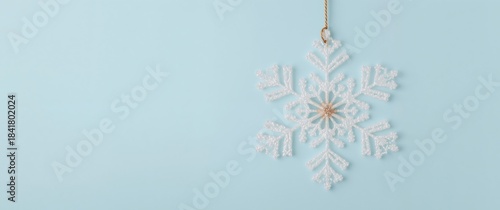 Snowflake Ornament, Light Blue Backdrop, Winter Holiday, Abstract Festive Element.