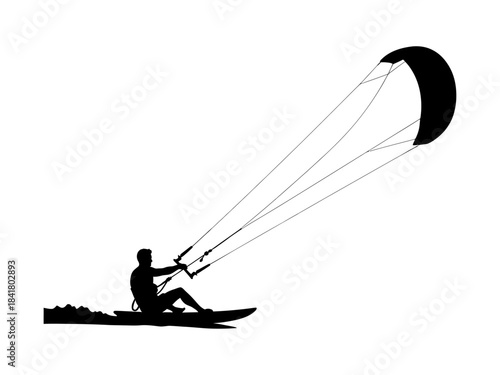 Silhouette of a person kitesurfing on water, a dynamic watersport scene.