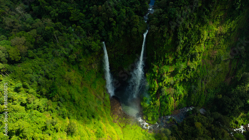 Zipline flights. Tad Fane waterfall in rainforest at Pakse and Champasak city Laos. Tour tourism and travel in Asia.