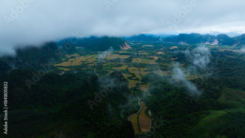 Aerial view of Nam Xay view point in Vang Vieng, Laos. Cinematic drone shot of famous tourist travel destination