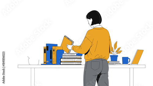Person organizing books on a desk, creating an illustration of study and work