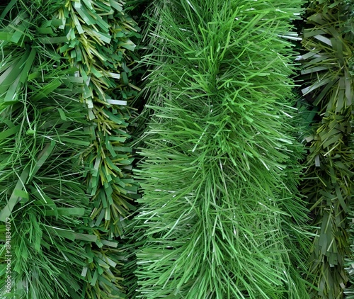 Fondo con guirnaldas de color verde para decoración de Navidad a la venta en comercio