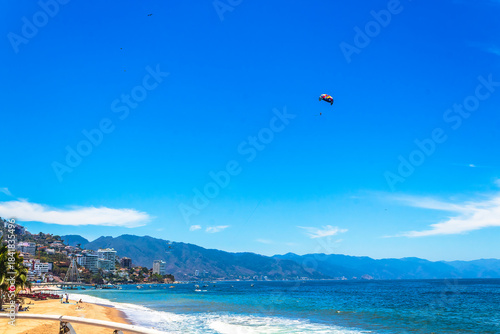 Man parachuting of colors in Puerto Vallarta, Jalisco