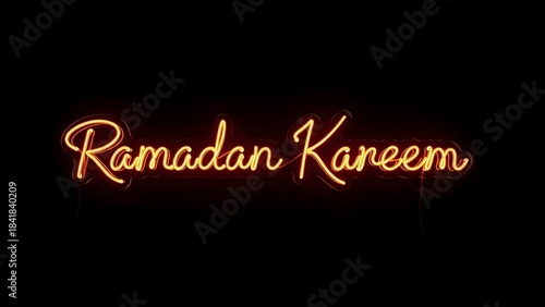 A vibrant orange neon sign spelling out the greeting 