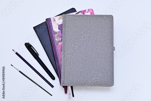notebooks and notepads, writing supplies for study on white background